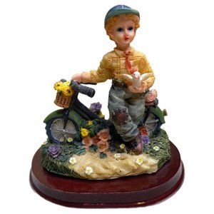 Vintage Dolgencorp Inc. Boy and His Bike Figurine